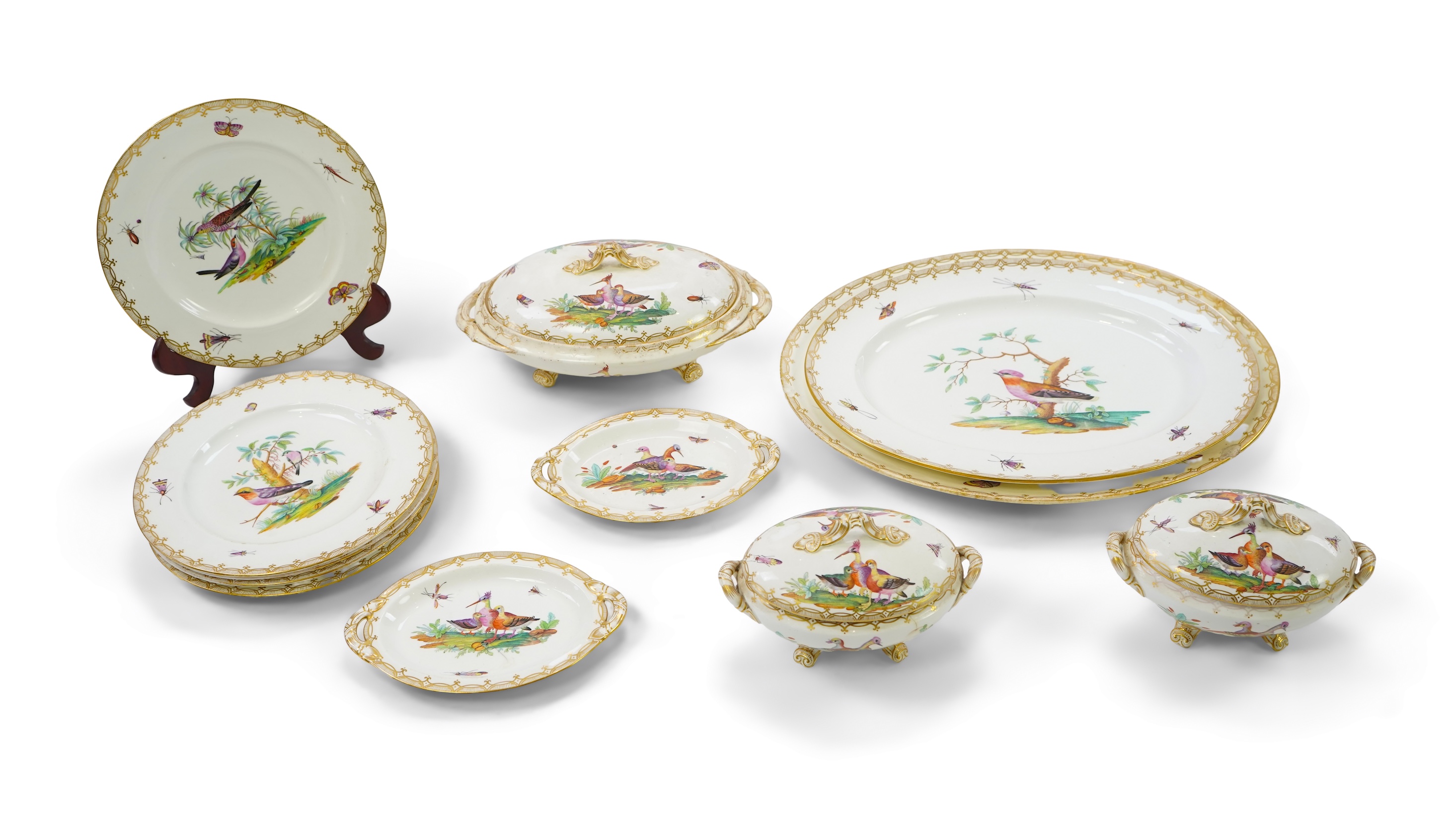 A Coalport bird painted part dinner service, mid 19th century